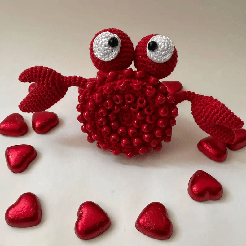 Red sensory crab with hearts